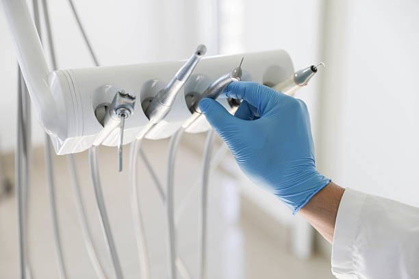 Professional Tooth Extraction technician working in Frankfort, KY